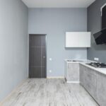 grey kitchen paired with ten wall colors
